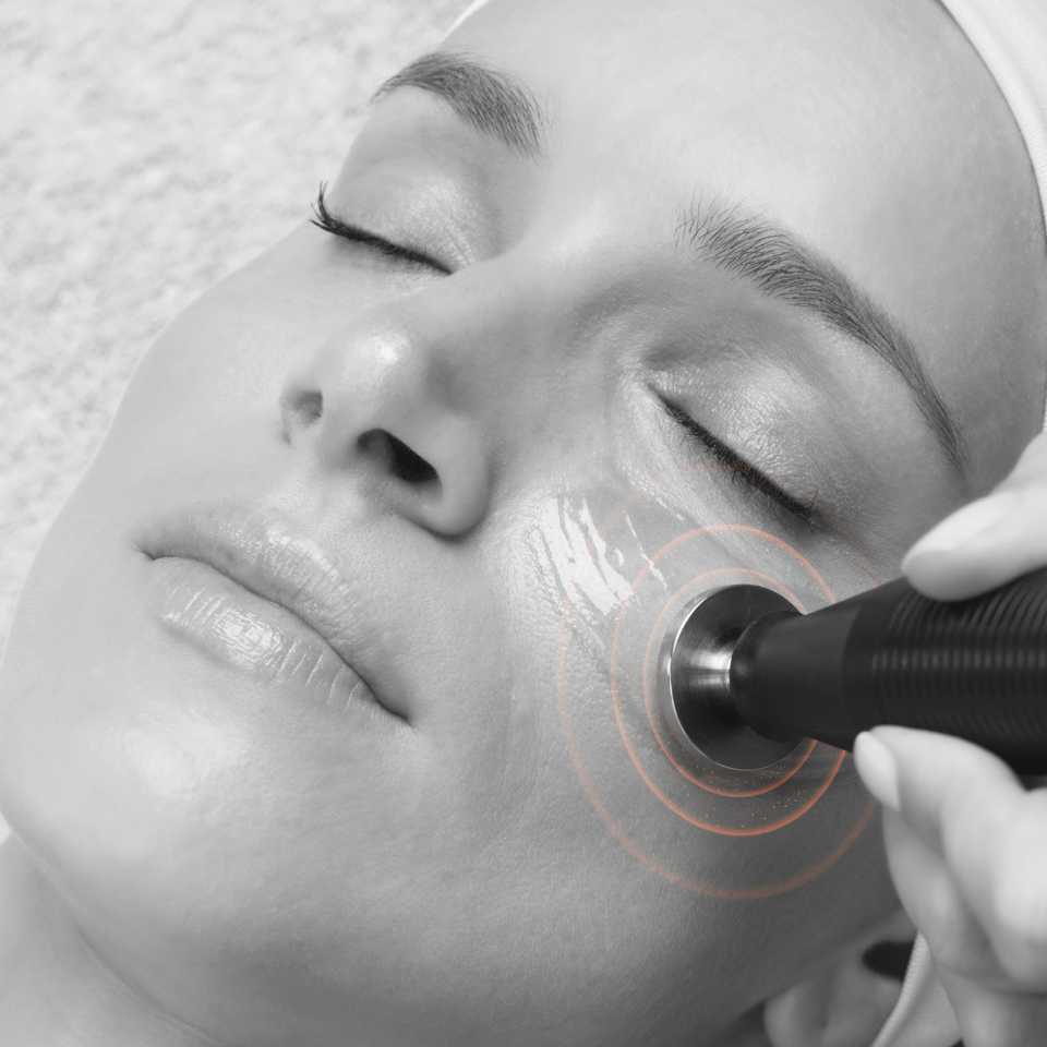 A woman having electrosonic essential treatment