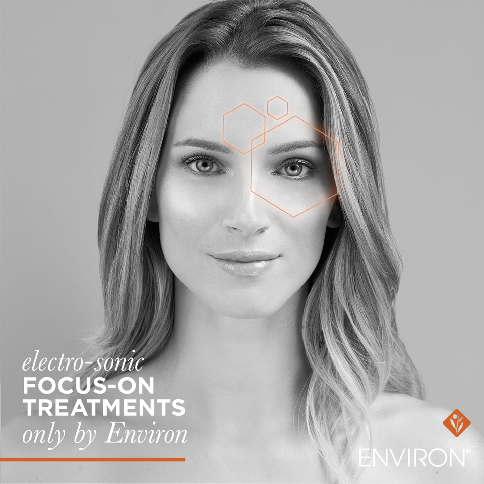 A womans face with a focus on electrosonic treatment results